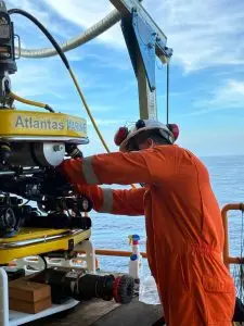 Technician preparing the ROV on the platform deck